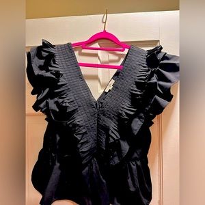 New shirt with no tags. It’s a L but fits like a M